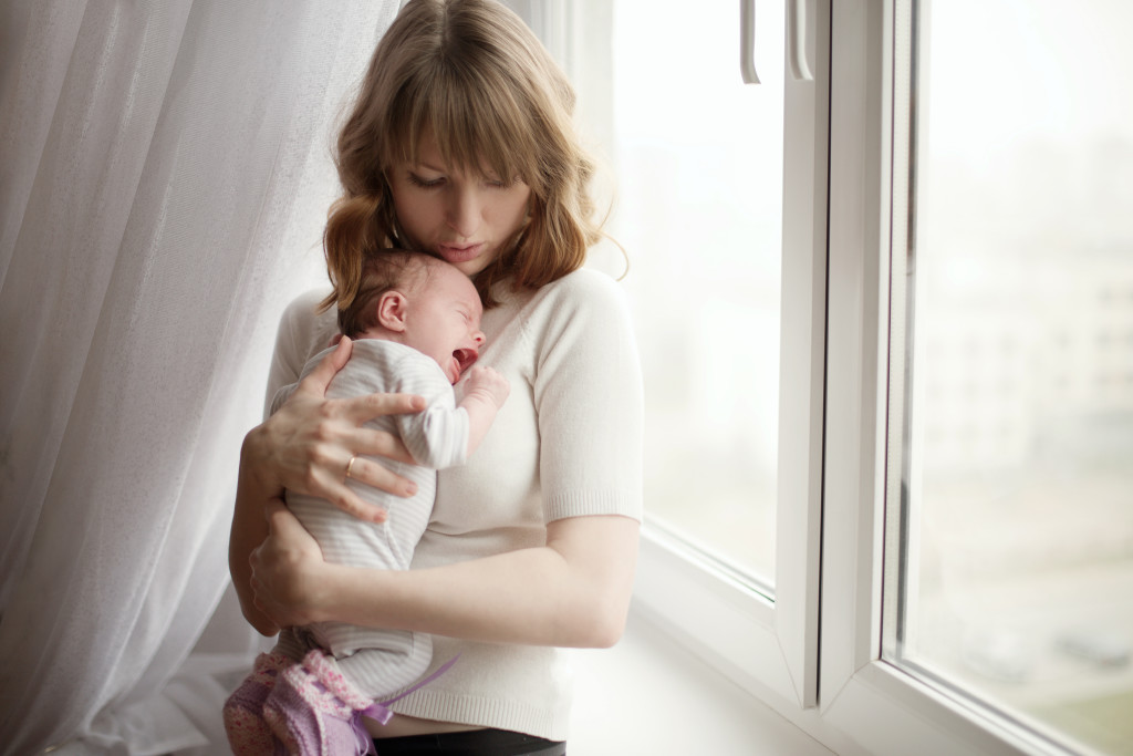 5 Things You Won't See a New Mom Post of Social Media (And How Becoming a Postpartum Doula Can Help)