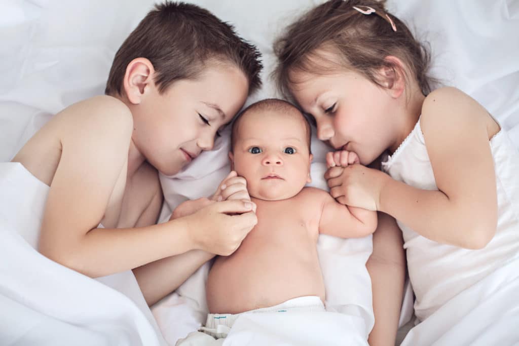 Using Your Doula Training to Support Older Siblings